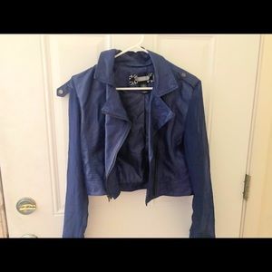 Blue leather jacket with sheer arms